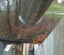 archimedes screw and trough being craned into place
